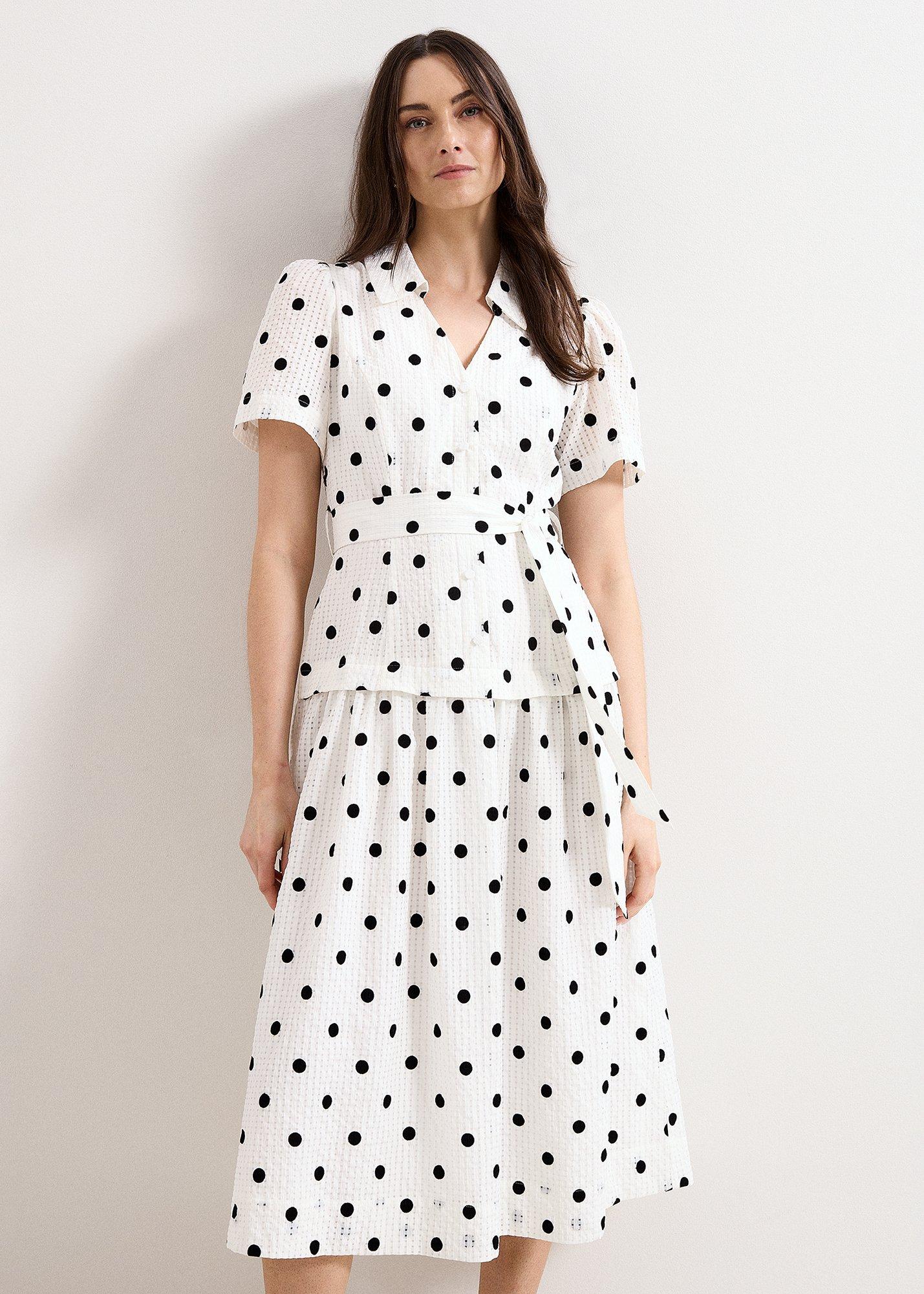 petite-adele-black-and-ivory-spot-textured-swing-dress