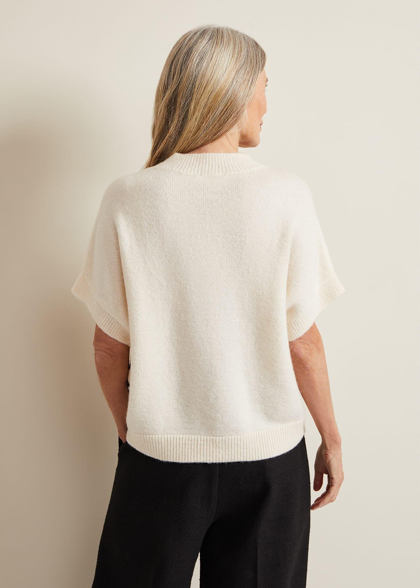 Arianna Tabard aus Strick mit Applikation